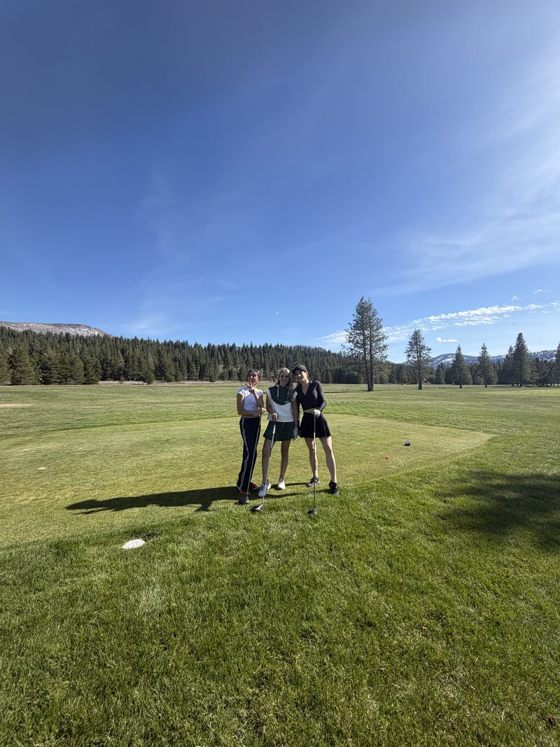 Three members on the tee box